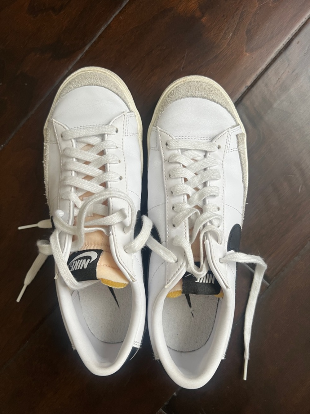 Nike Blazers - White and Black Low-Top Leather Sneakers with Cream Accents